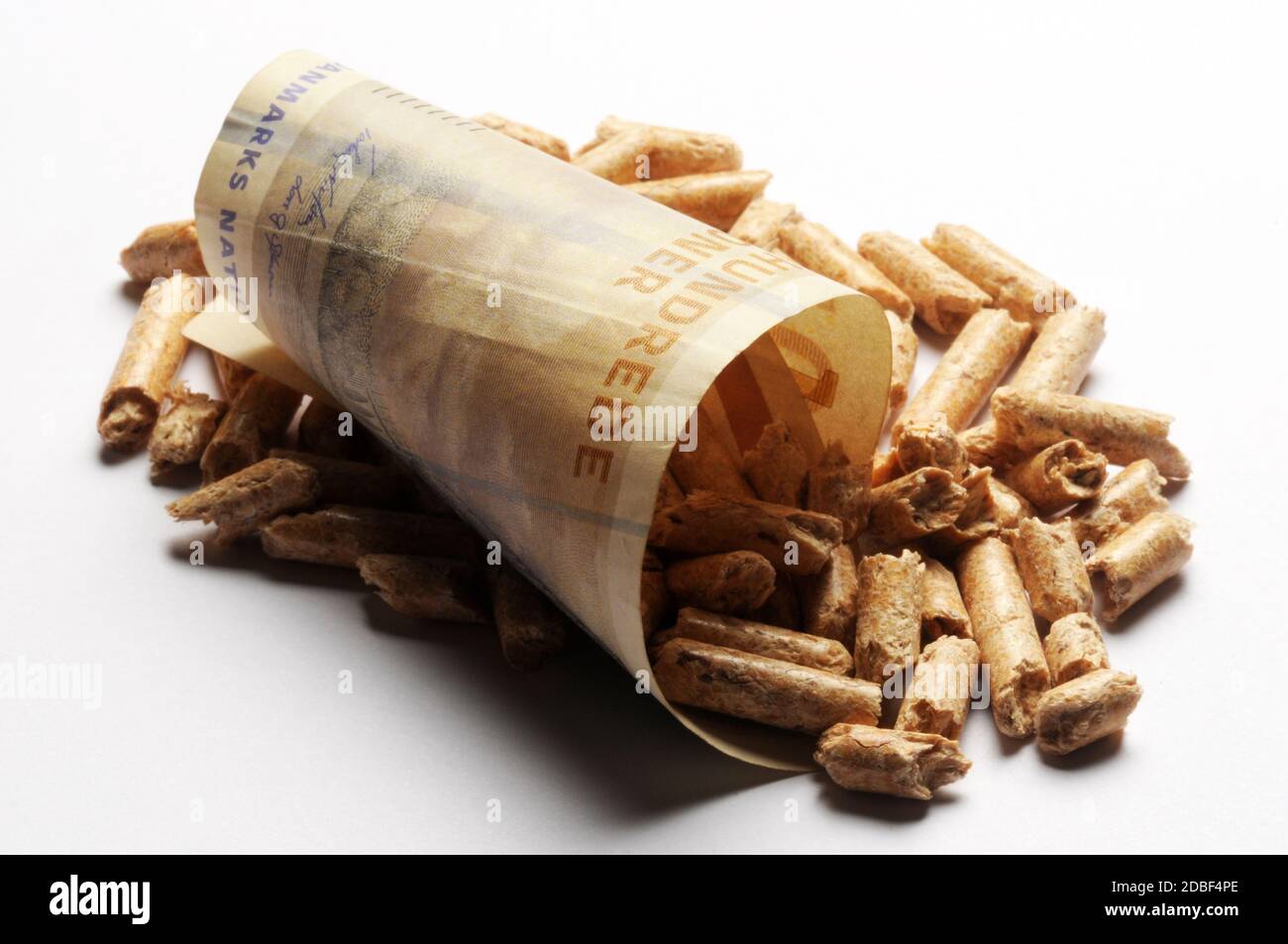 Close up on danish currency with wood pellets Stock Photo