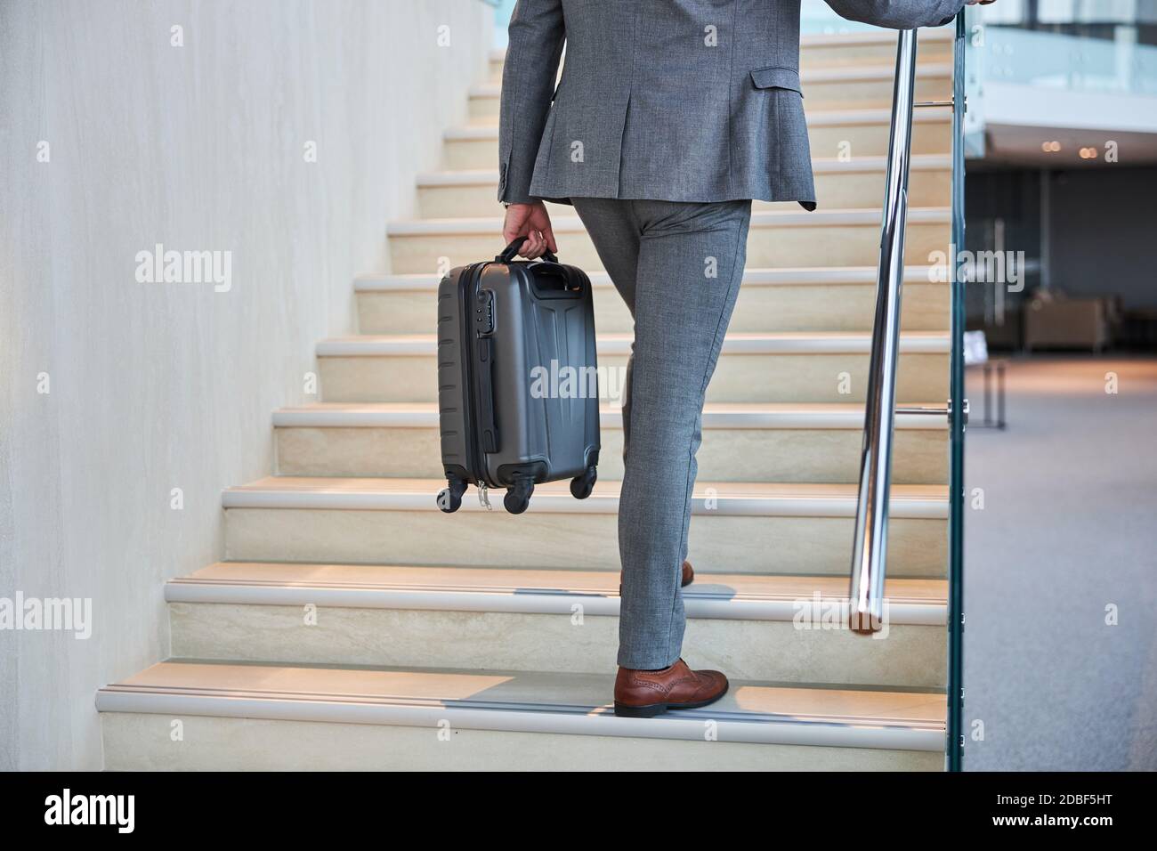 Carrying luggage up stairs hires stock photography and images Alamy