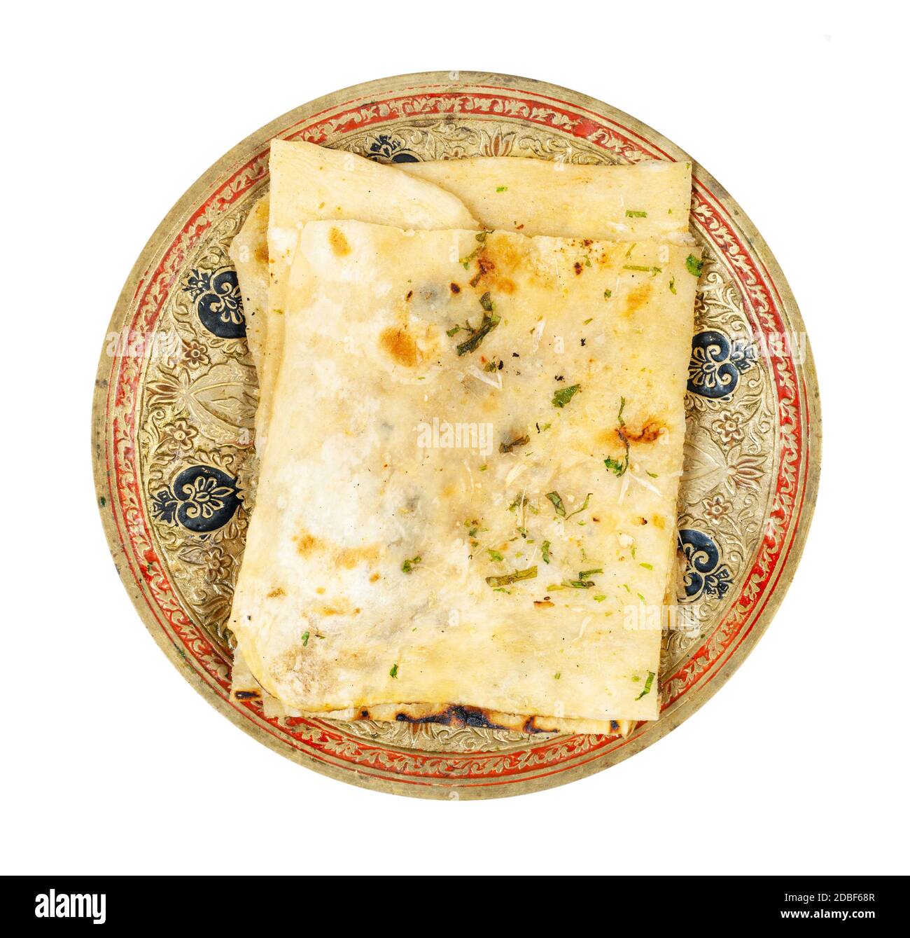 Indian cuisine top view of garlic naan (garlicky flatbread) on brass