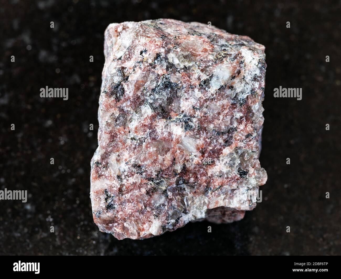 Small Pink Rocks closeup of sample of natural mineral from geological collection - rough ...