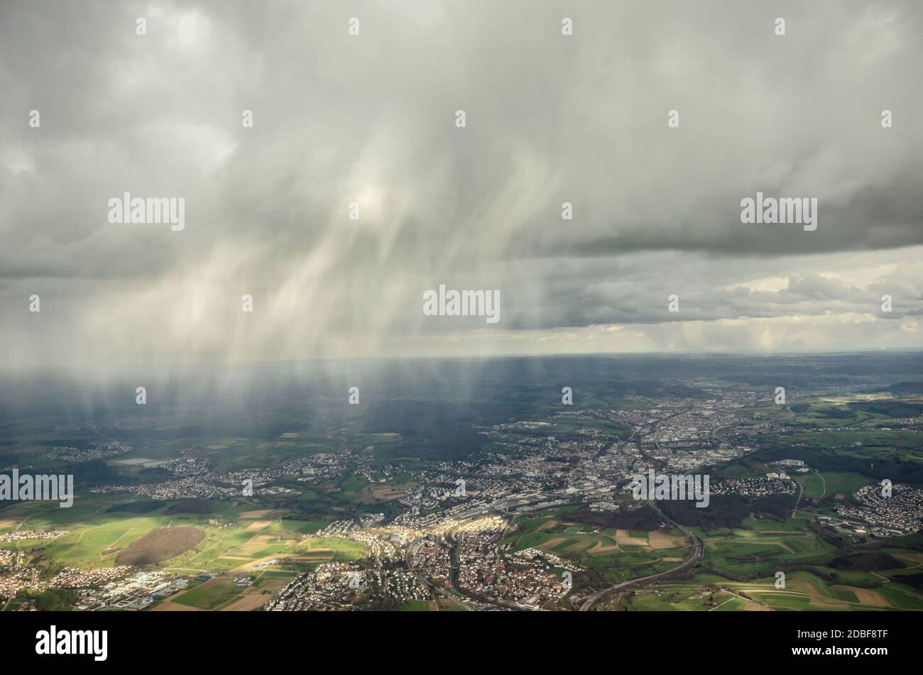 Weather phenomenon seen from above from an airplane flying over Germany. Stock Photo