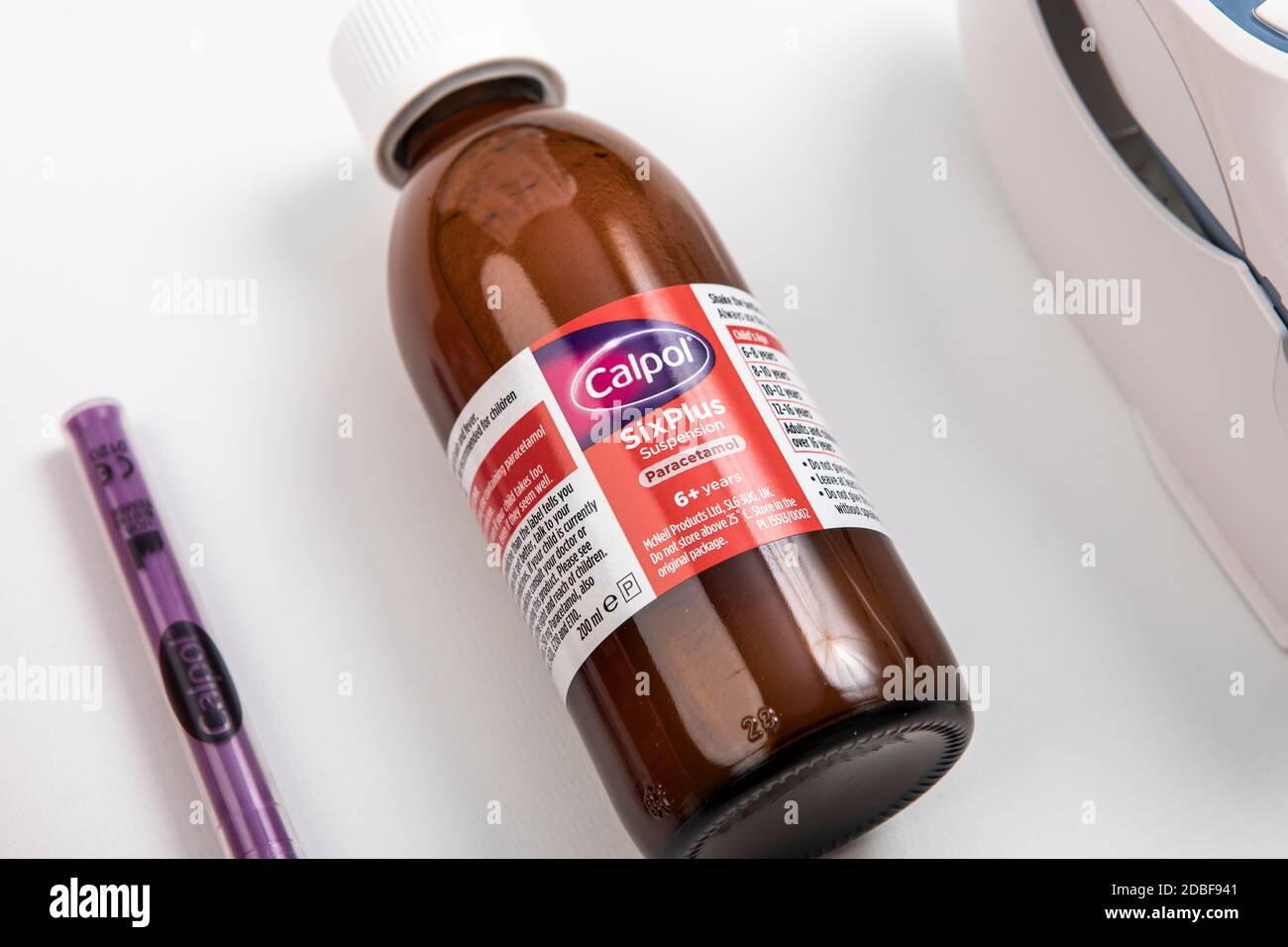Calpol kids medicine and thermometer Stock Photo Alamy