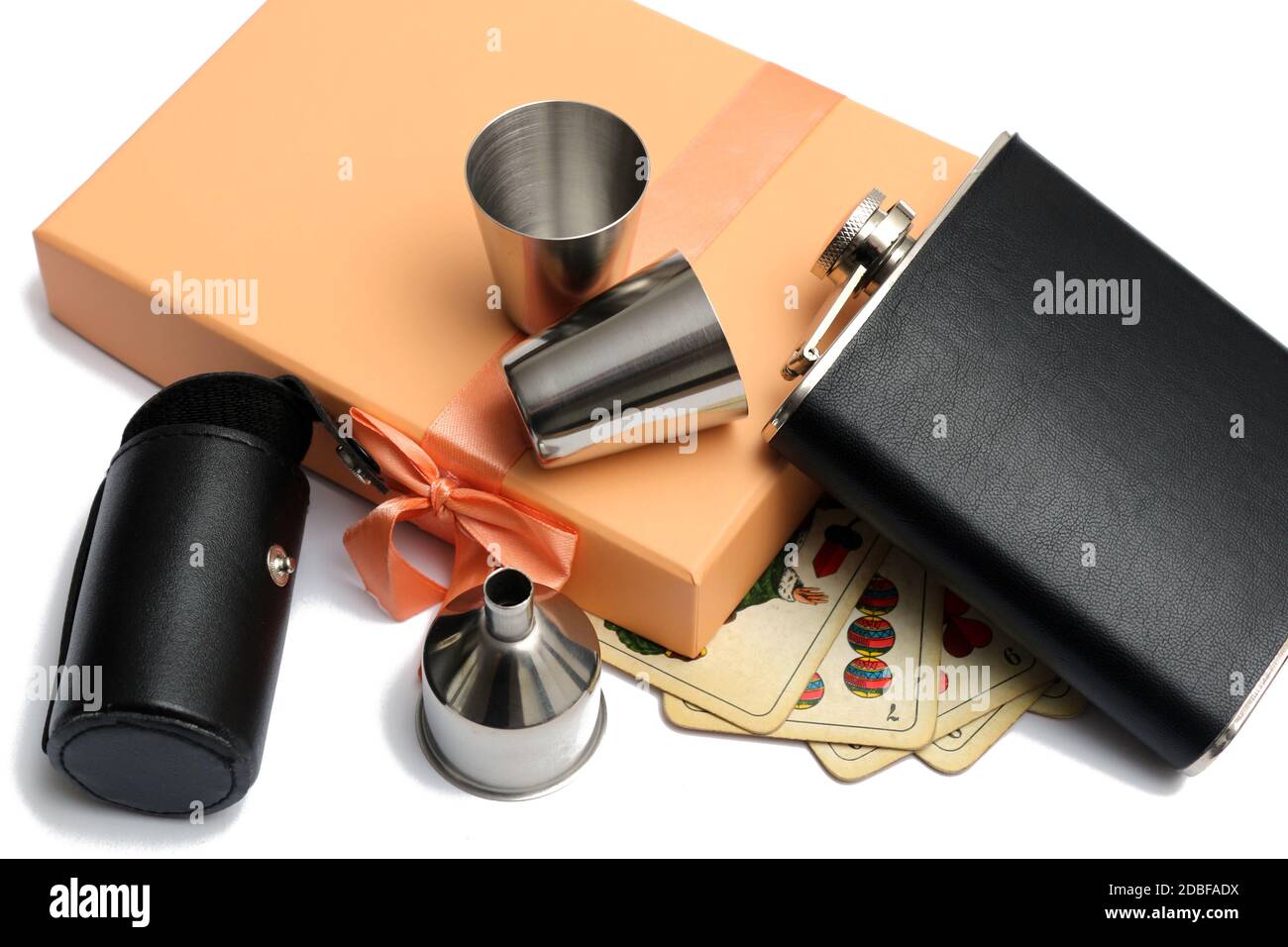 small leather hip flask with metal mugs and pocket and funnel at orange