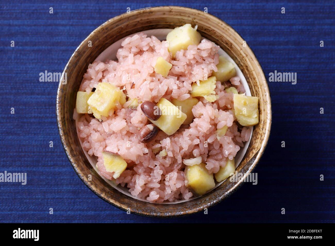 Japanese cooked sekihan rice with red beans in a bowl on table, top view Stock Photo