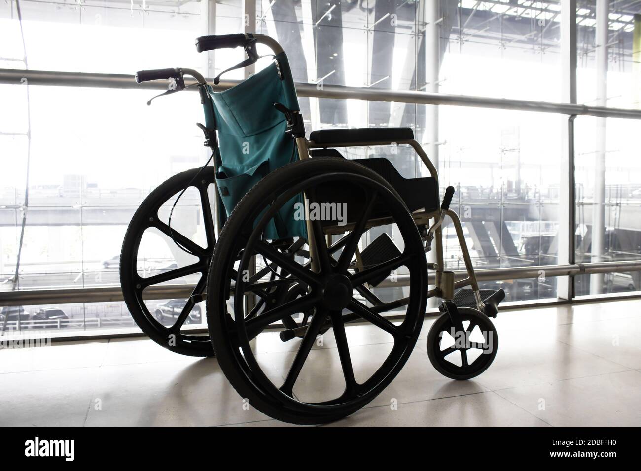 Wheelchair service in airport terminal Stock Photo Alamy