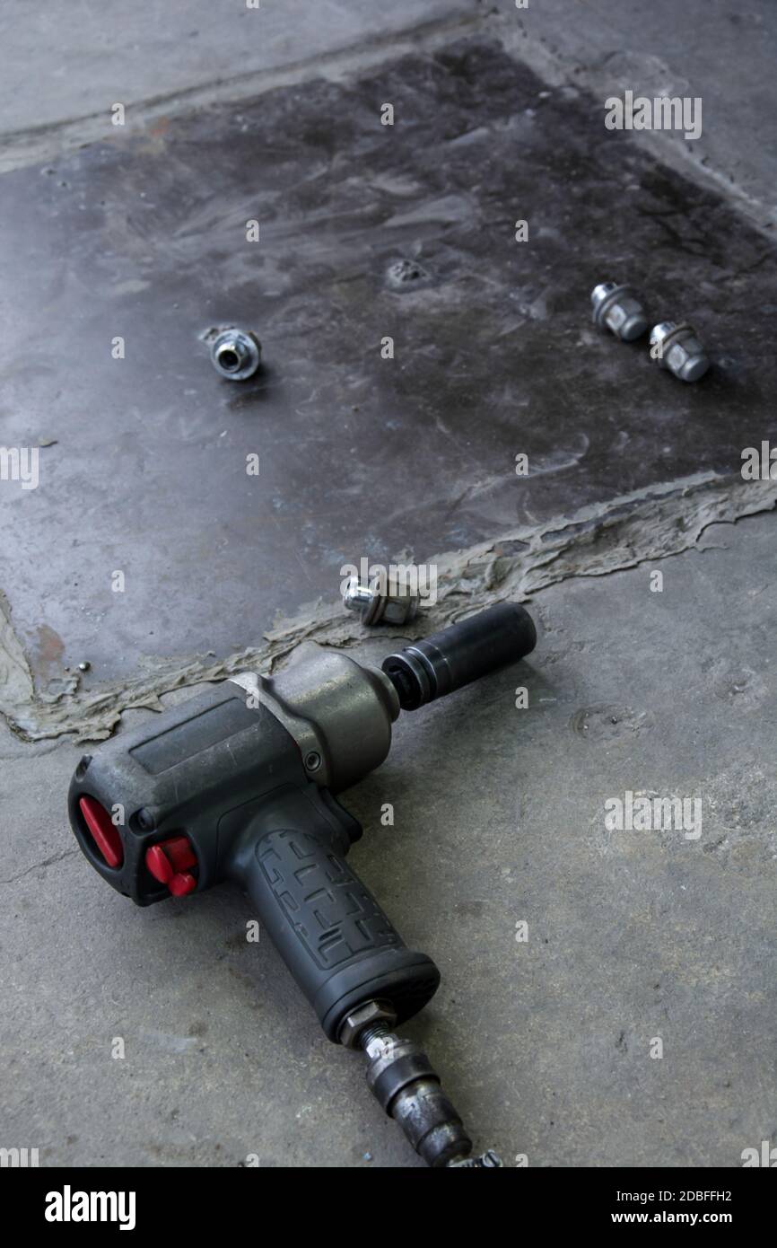 mechanics impact wrench laying on the blacktop Stock Photo Alamy