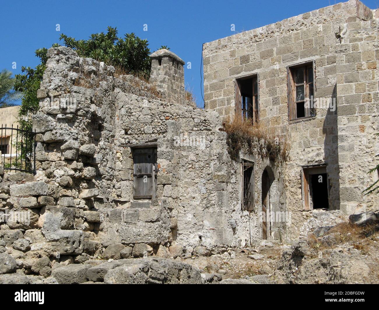 Ruins of buildings around the Medieval Old Town of Rhodes Stock Photo ...