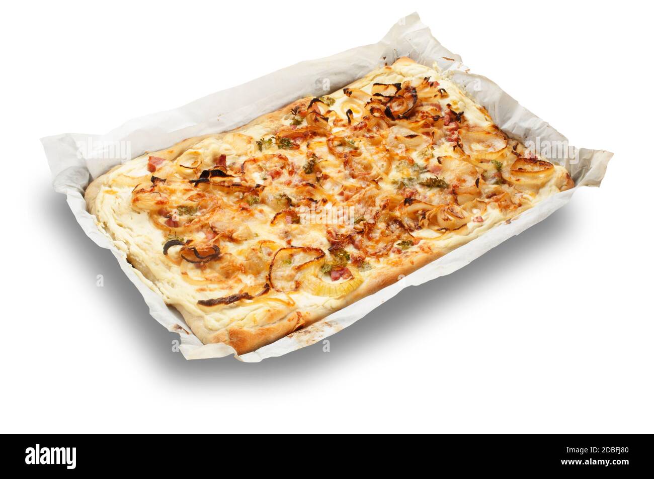 Studio shot of Tarte Flambee or Flame Cake cut out against a white background - John Gollop Stock Photo