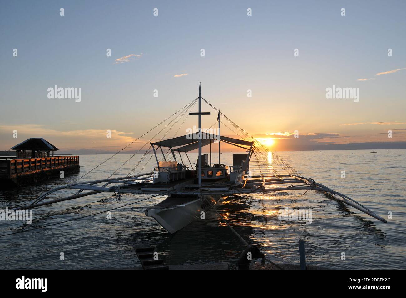 boat in the sunset in the Philippines Stock Photo