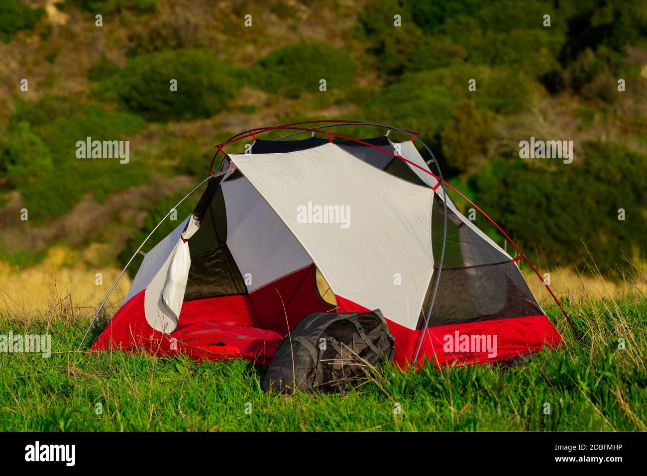 Tent for lightweight trekking for 2 people. Camping and backpacking tent with 2 doors. Easy setup tent. Stock Photo