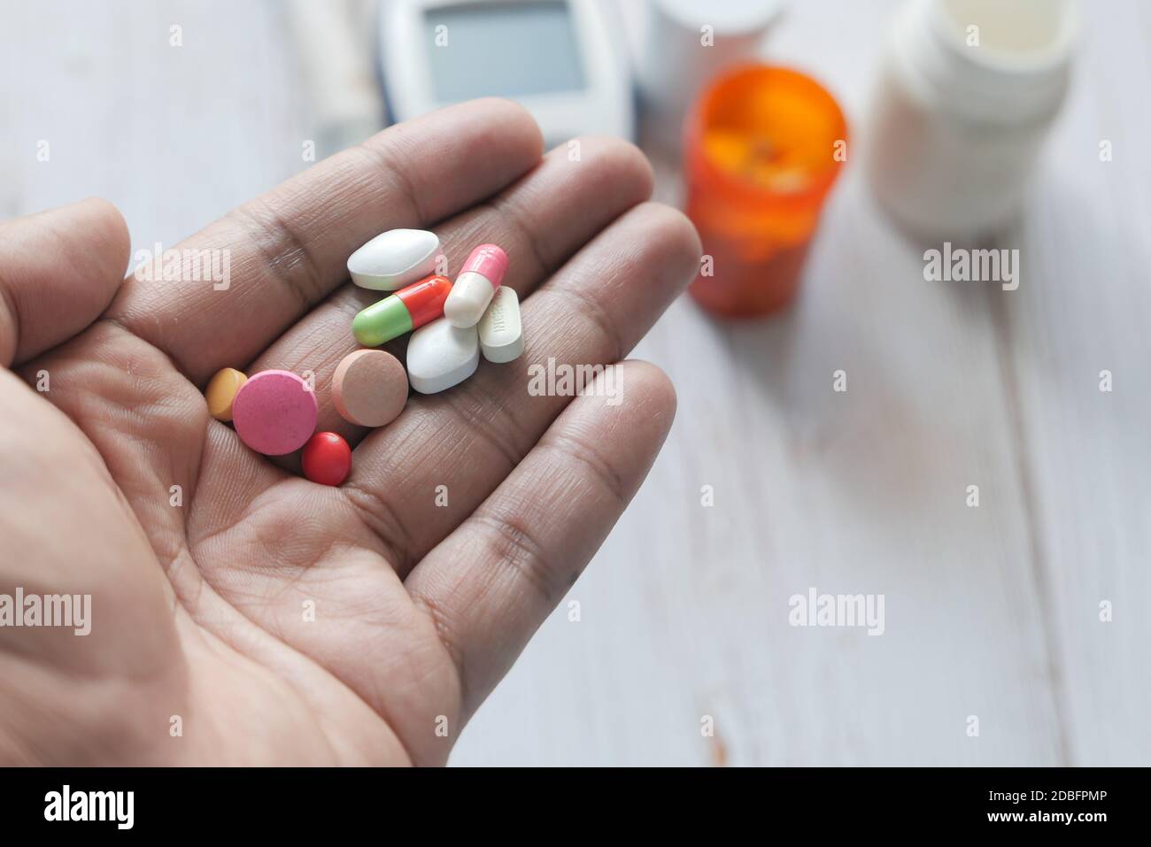 hand holding pills with copy space  Stock Photo