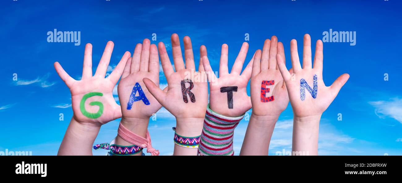 Children Hands Building Colorful German Word Garten Means Garden. Blue