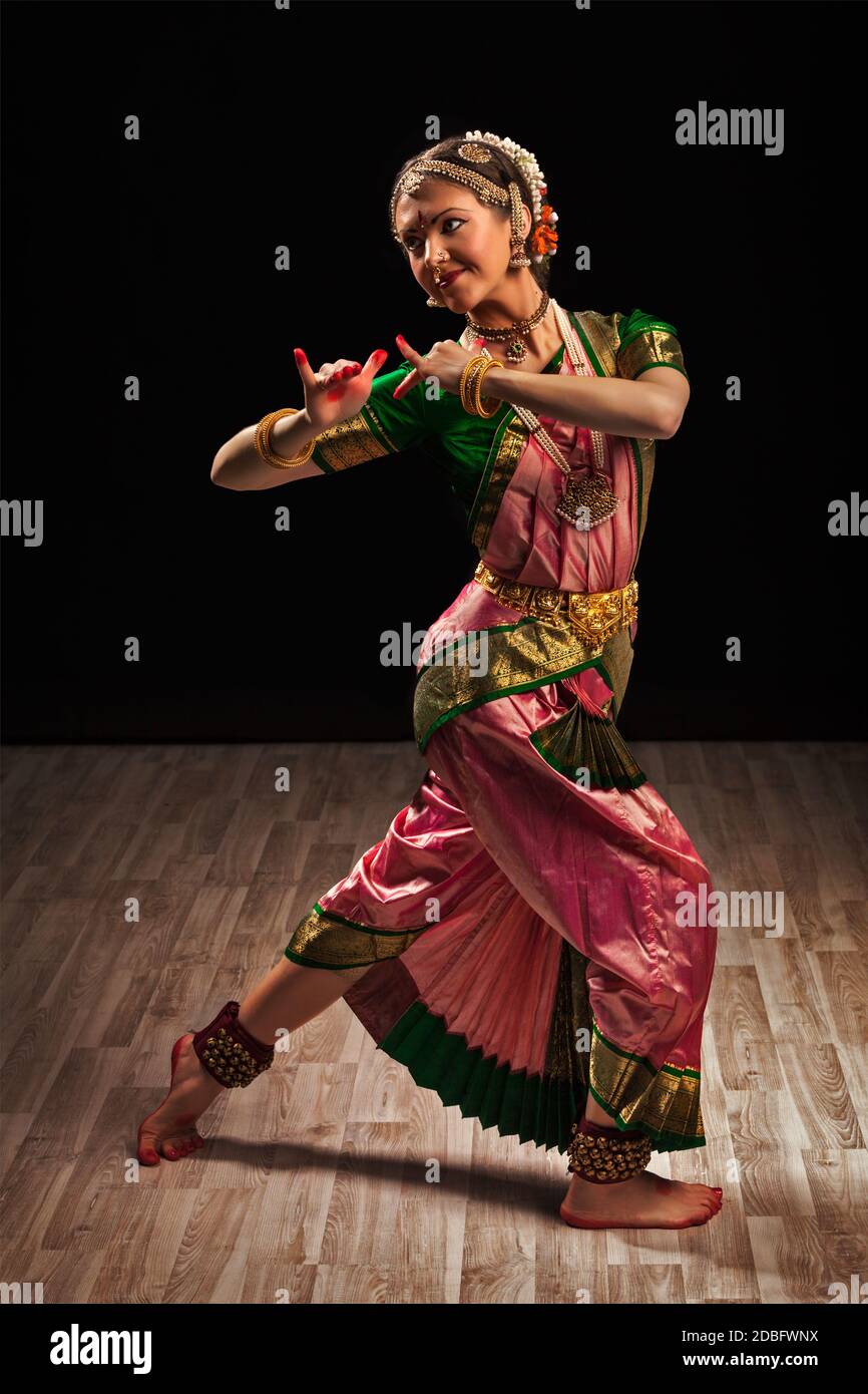 Young beautiful woman dancer exponent of Indian classical dance  Bharatanatyam in Krishna pose Stock Photo - Alamy