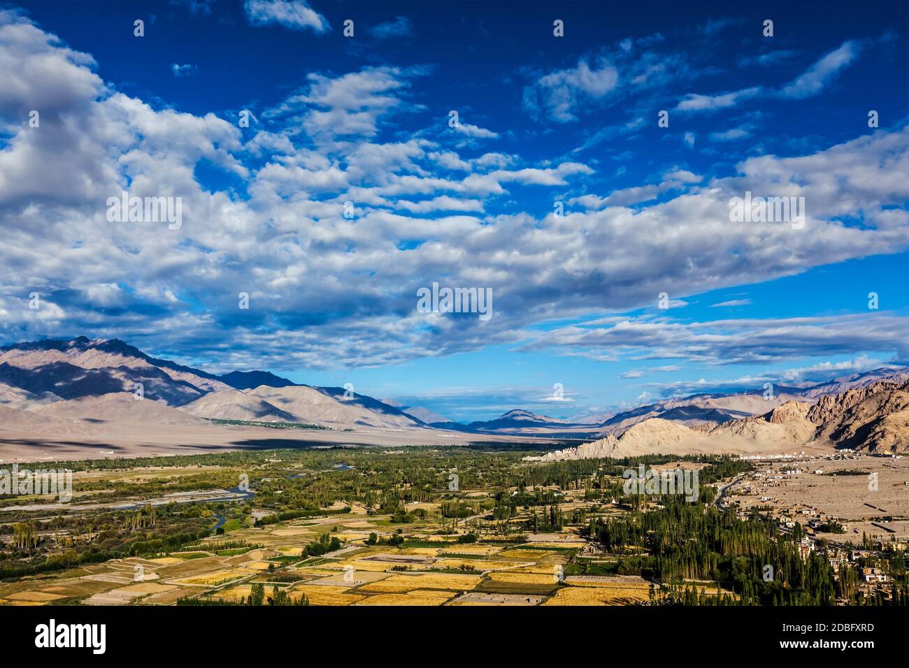 Himalayan landscape of historic Indus valley surrounded by Karakoram range of Himalaya mountains. View from Buddhist temple Thiksey gompa. Ancient civ Stock Photo