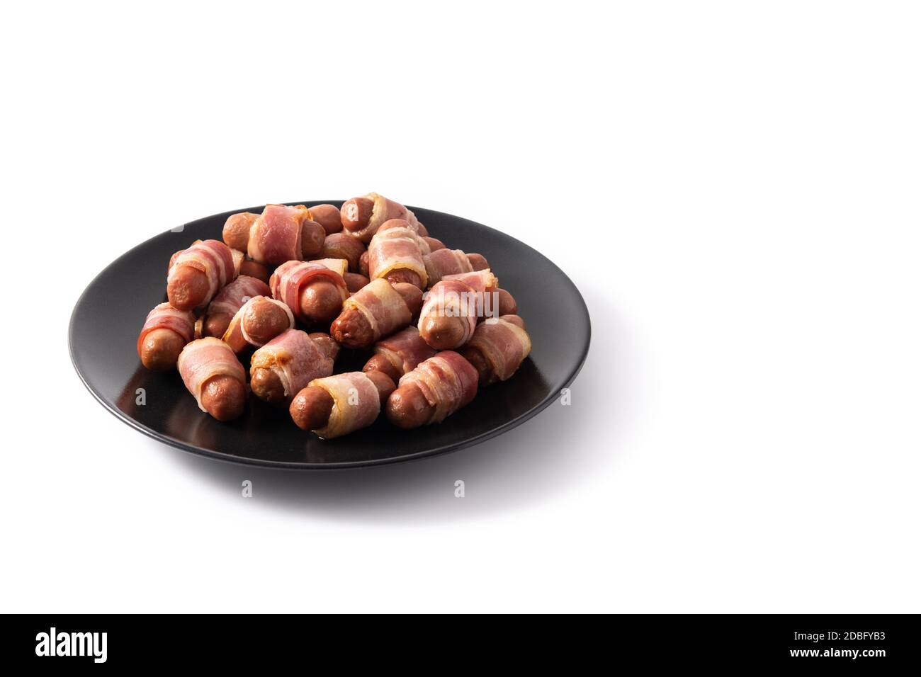 Pig in blankets. Sausages wrapped in smoked bacon isolated on white background Stock Photo Alamy