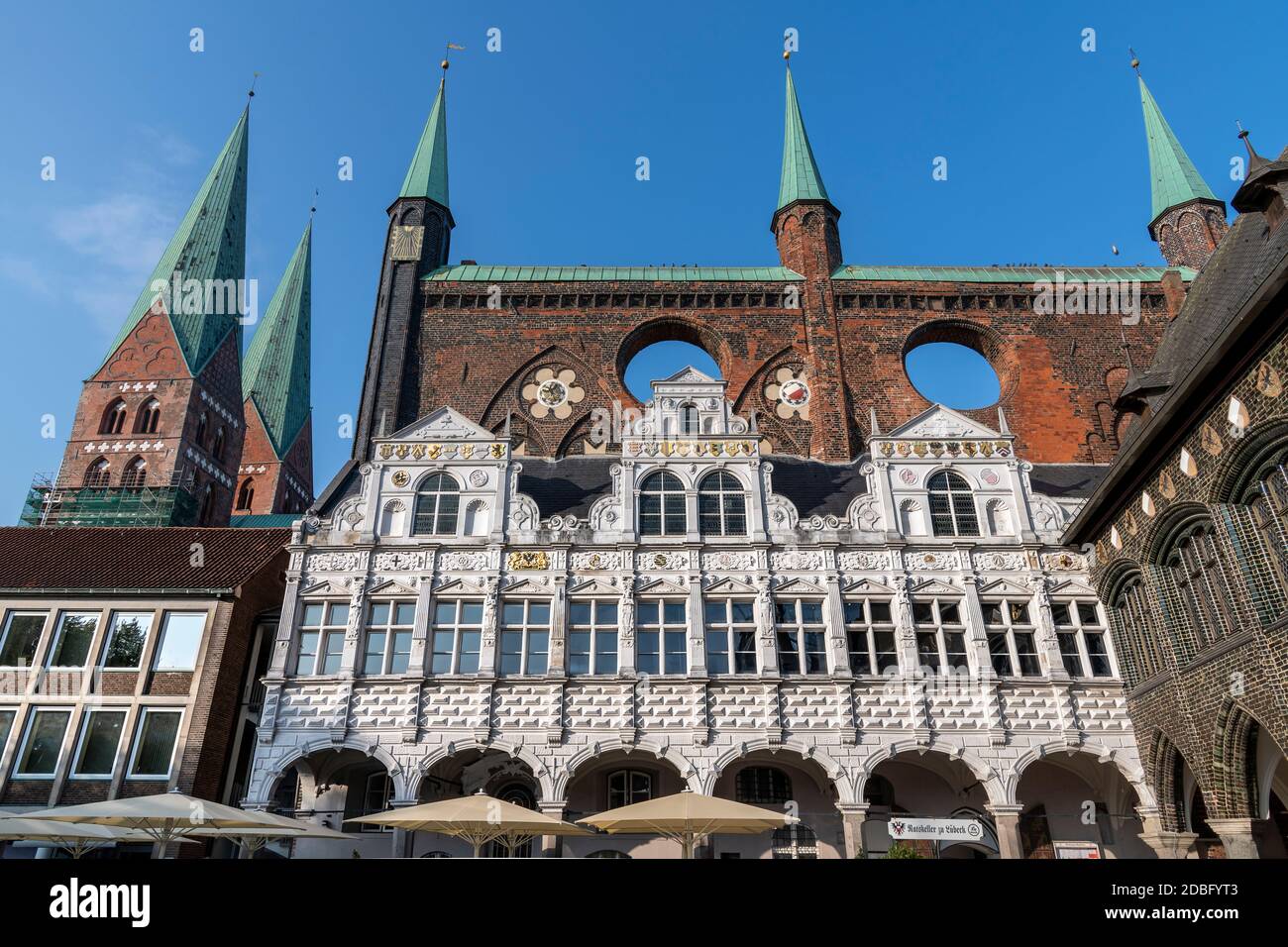 Stadtverwaltung Hansestadt Lübeck. This 1226 town hall has ornate arched buildings, in styles from Gothic to Renaissance - plus wind holes too! Stock Photo