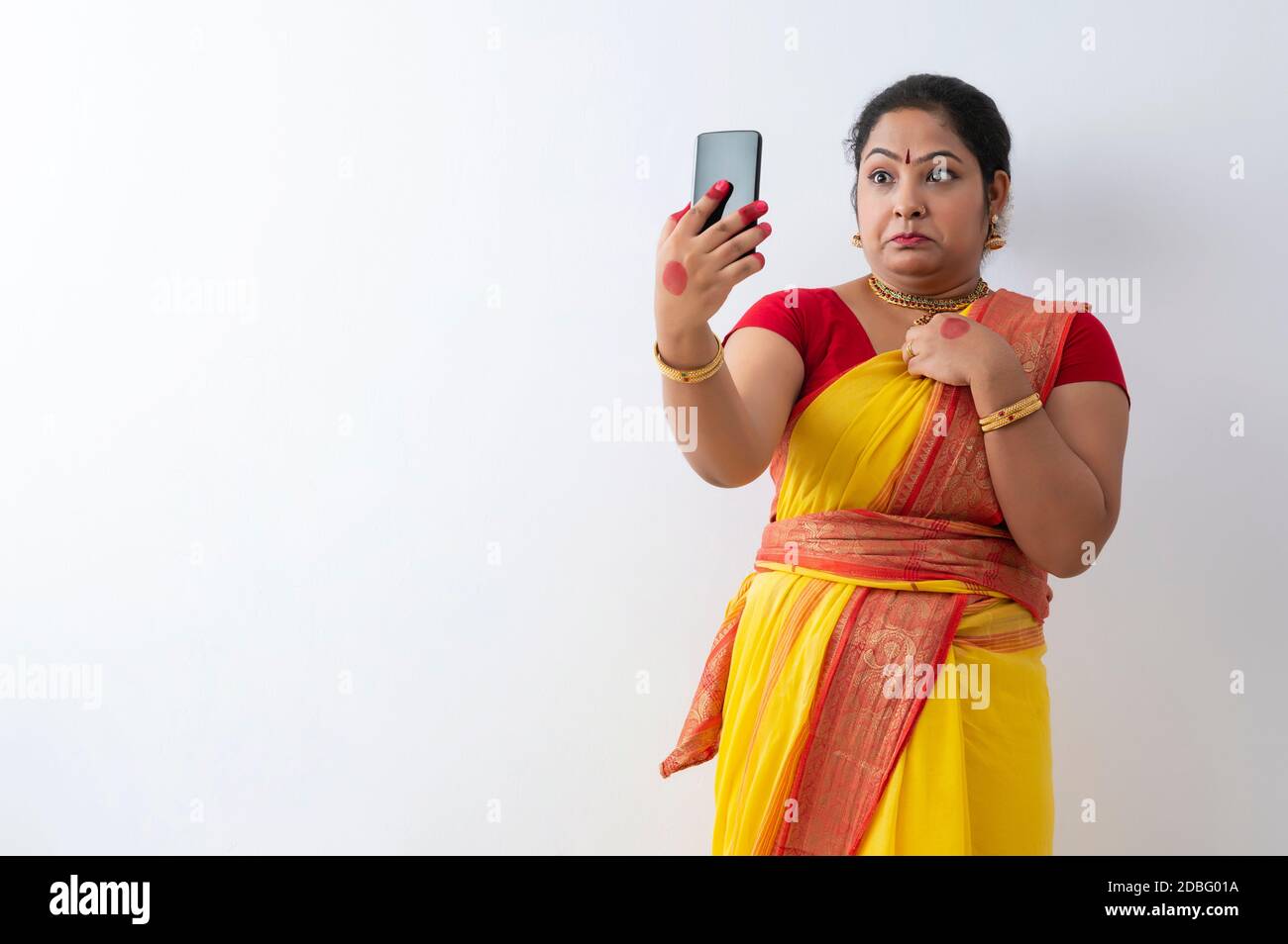 Kuchipudi dancer talking to her friends on videocall Stock Photo