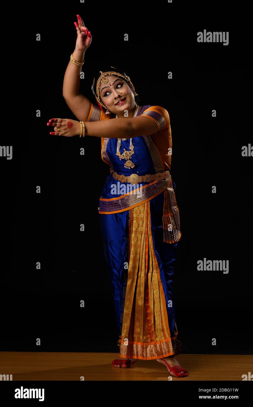 Kuchipudi dancer depicting a Peacock through her performance Stock Photo