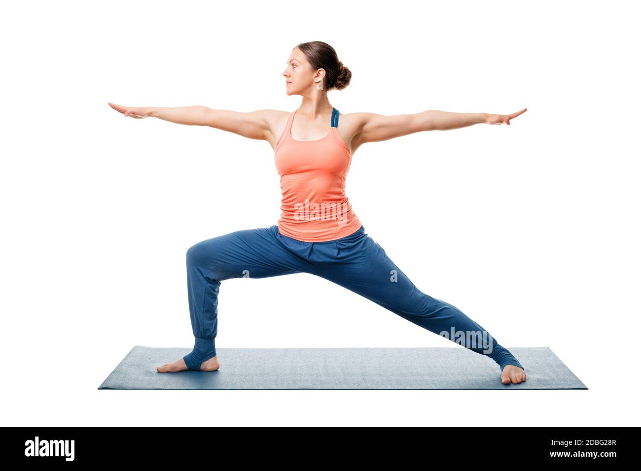 Slim woman doing Virabhadrasana A on yoga mat - a Royalty Free Stock Photo  from Photocase