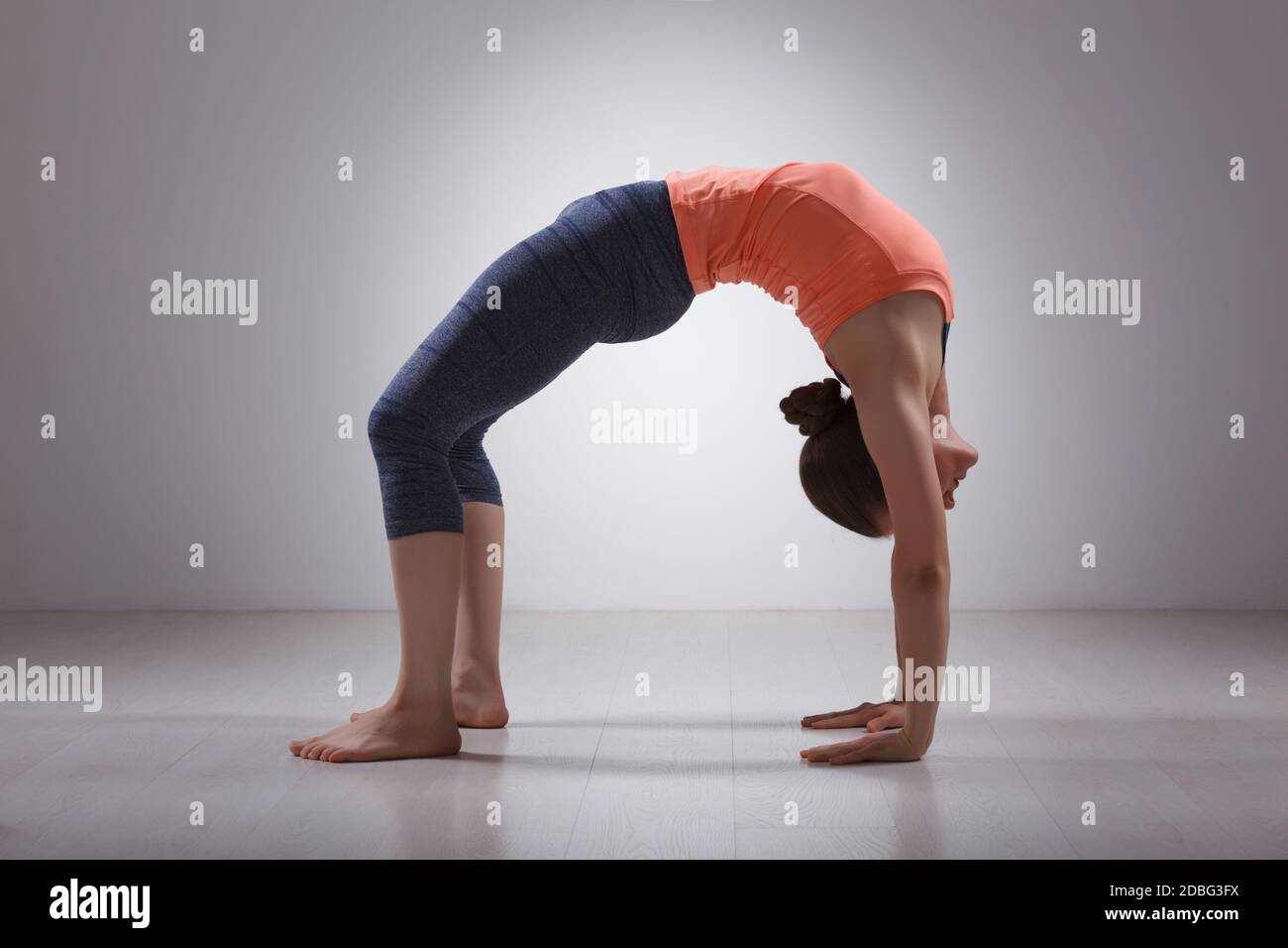 Beautiful sporty fit yogini woman practices yoga asana chakrasana (or urdva  dhanurasana) - wheel..., Stock Photo, Picture And Low Budget Royalty Free  Image. Pic. ESY-055340284 | agefotostock