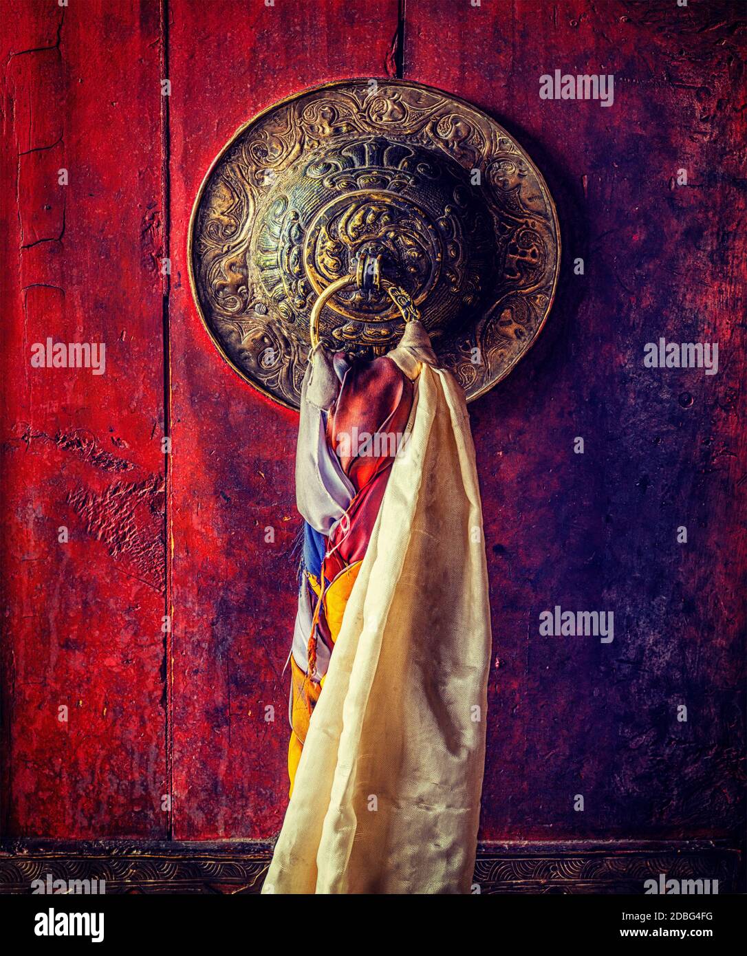 Vintage retro effect filtered hipster style image of door handle of gates of Thiksey gompa (Tibetan Buddhist monastery). Ladakh, India Stock Photo