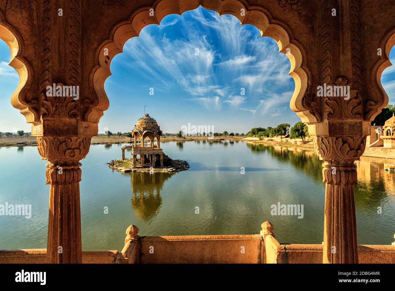 Indian landmark Gadi Sagar - artificial lake view through arch. Jaisalmer, Rajasthan, India Stock Photo