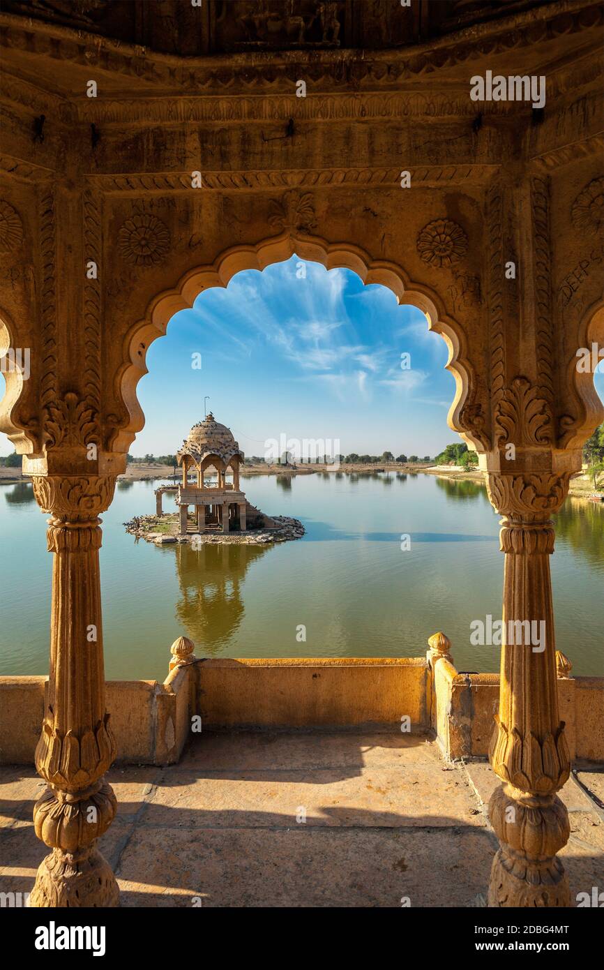 Indian landmark Gadi Sagar - artificial lake view through arch. Jaisalmer, Rajasthan, India Stock Photo