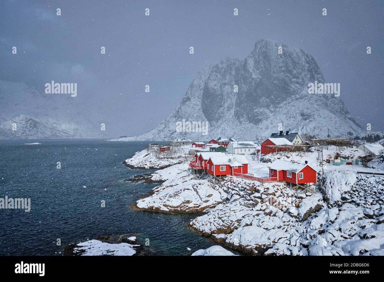 Iconic Hamnoy fishing village on Lofoten Islands, Norway with red rorbu ...