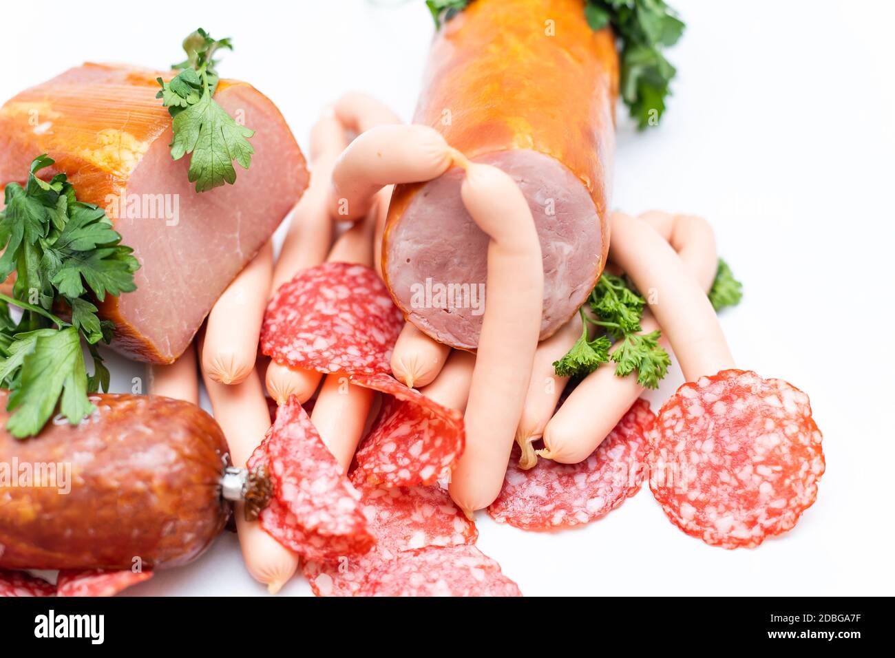 Meat and sausages. Isolated on white Stock Photo Alamy