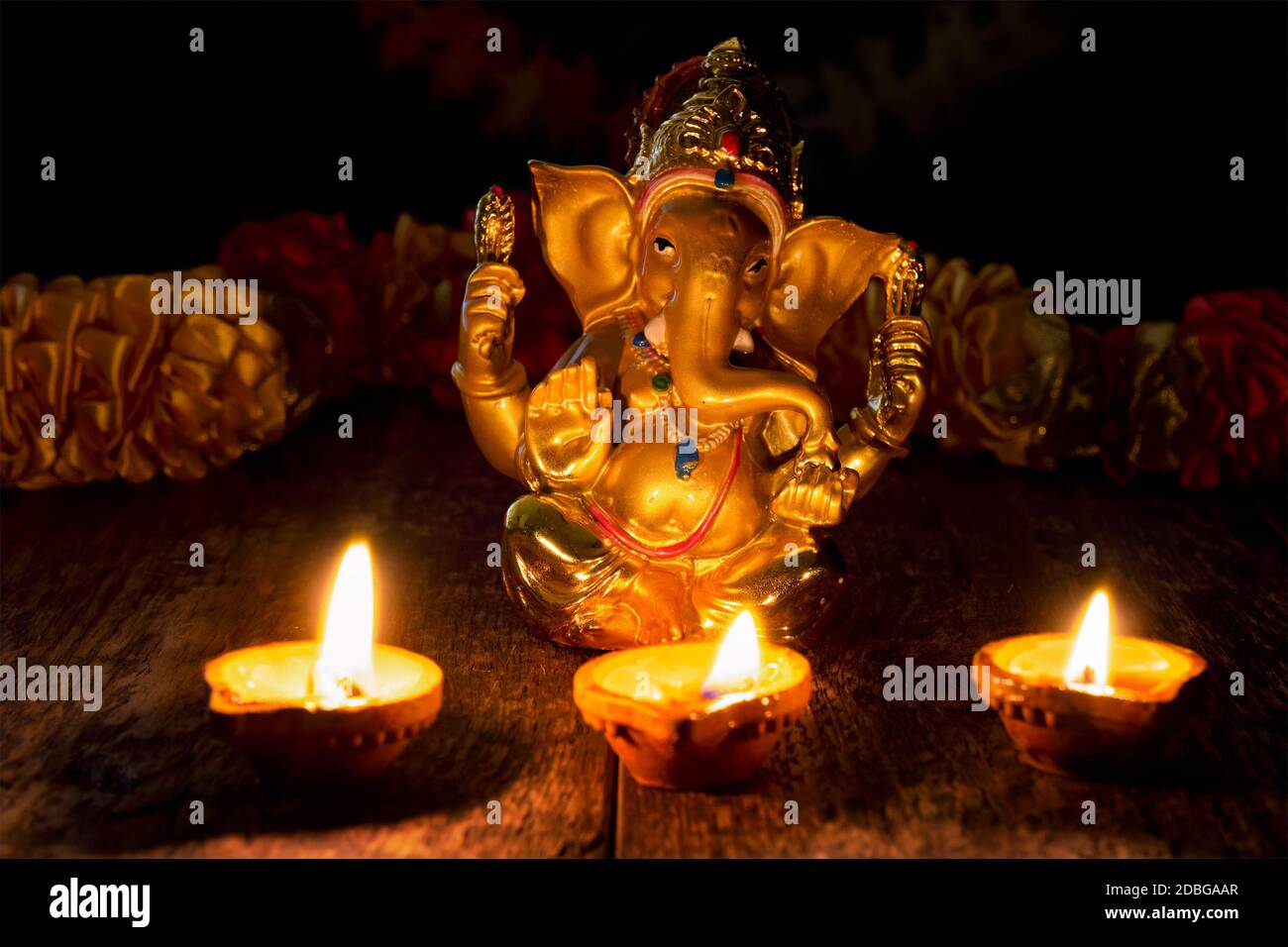 Ganesh Chaturthi or Diwali concept Ganesha figurine with Diwali