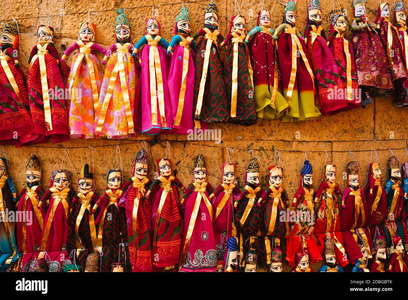 Colorful handmade traditional Rajasthani puppets for sale in Jaisalmer, Rajasthan, India. Stock Photo