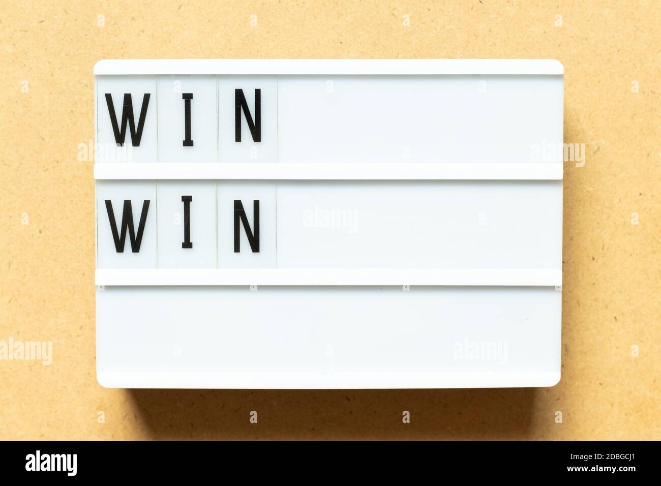 Lightbox with word win win on wood background Stock Photo