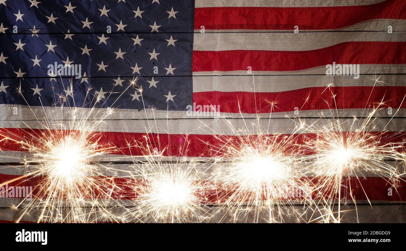 Happy 4th of July with the American flag and four sparkler with space ...