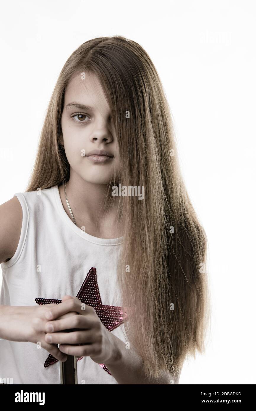Pretty Rub Partially bleached rub of a pretty girl with long hair Stock Photo - Alamy