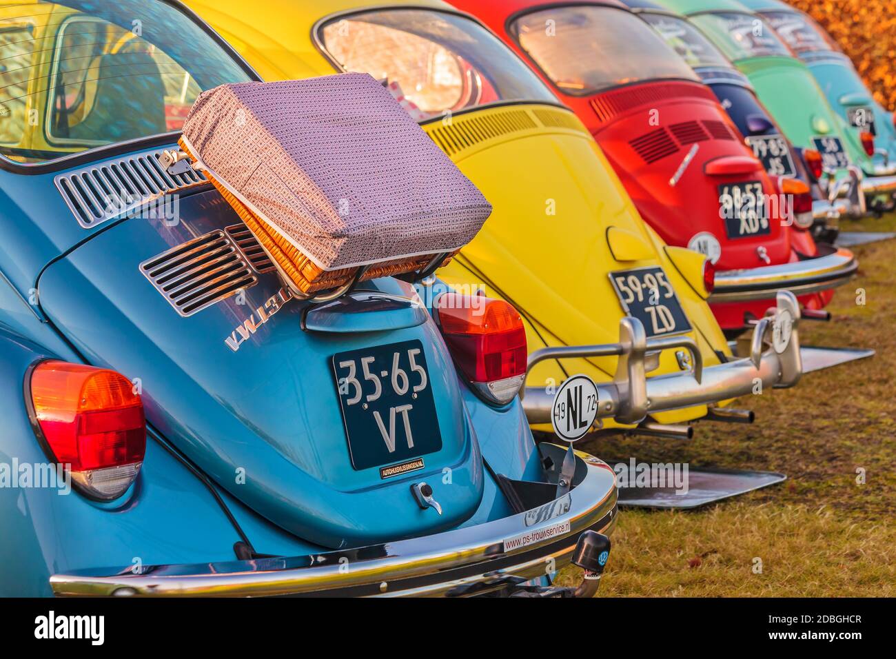 ROSMALEN, THE NETHERLANDS - JANUARY 4, 2015: Row of vintage Volkswagen Beetles from the seventies in Rosmalen, The Netherlands Stock Photo