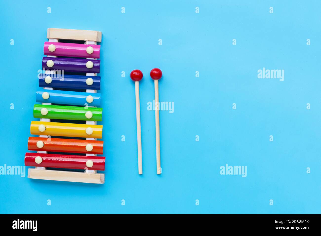 Colorful xylophone on yellow background. Copy space Stock Photo Alamy