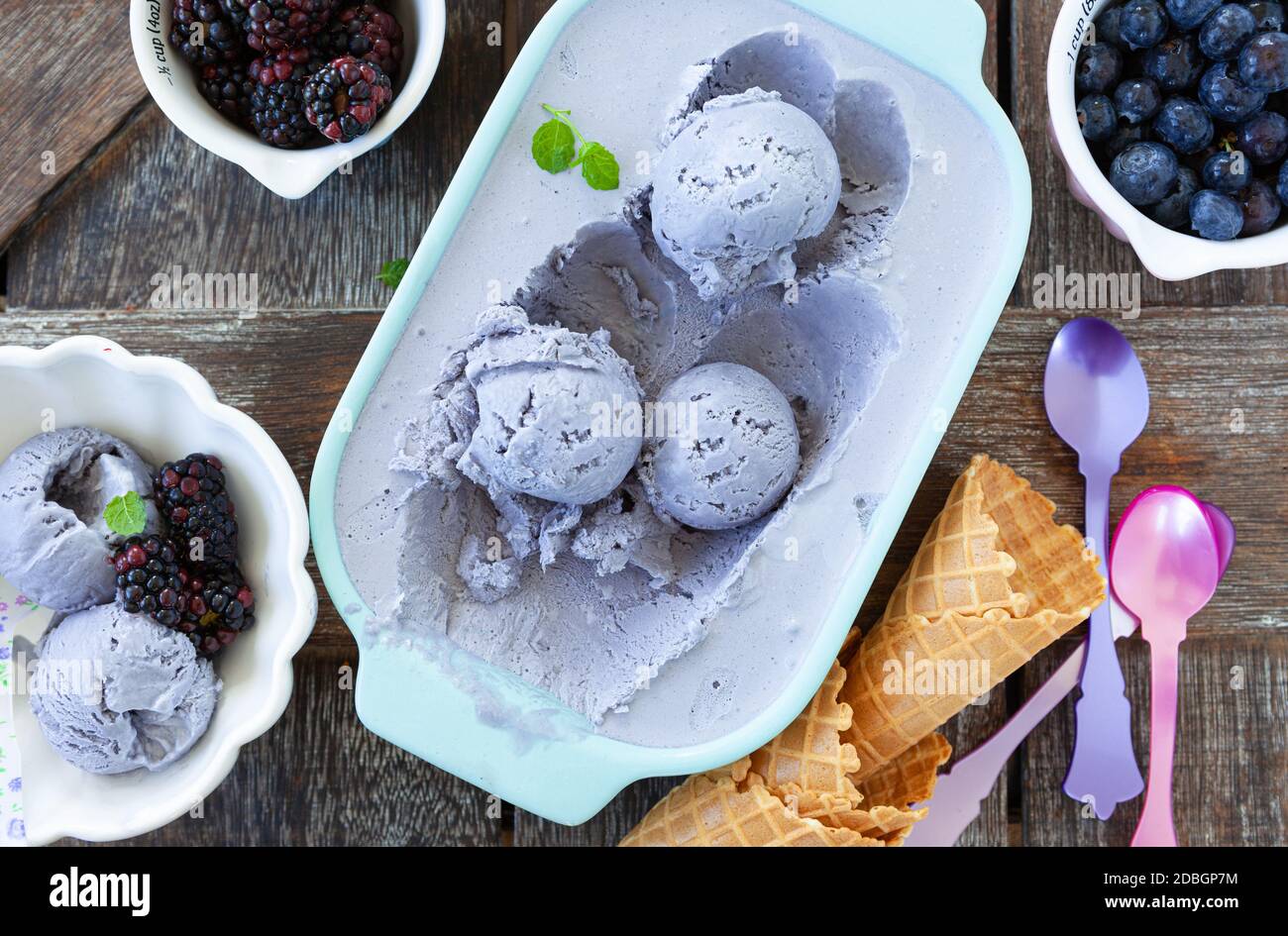 Homemade blueberry ice cream with waffle cones Stock Photo Alamy