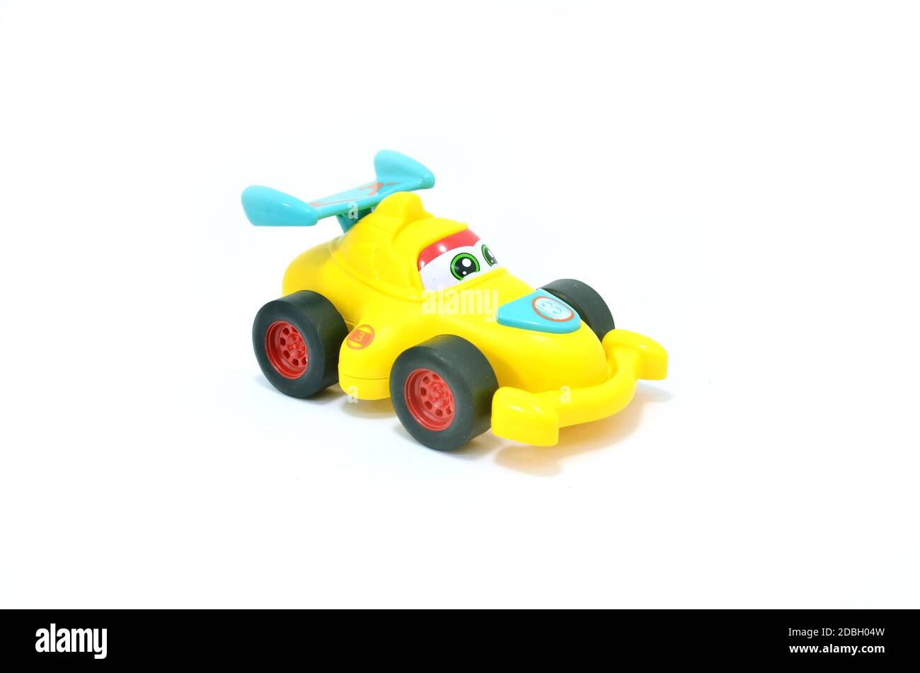 Yellow Toy Race Car Isolated on White Background Stock Photo