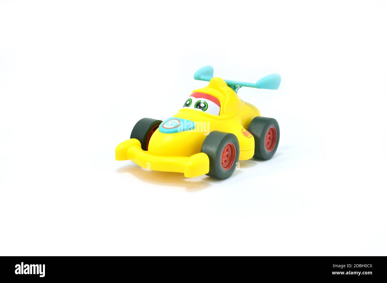 Yellow Toy Race Car Isolated on White Background Stock Photo