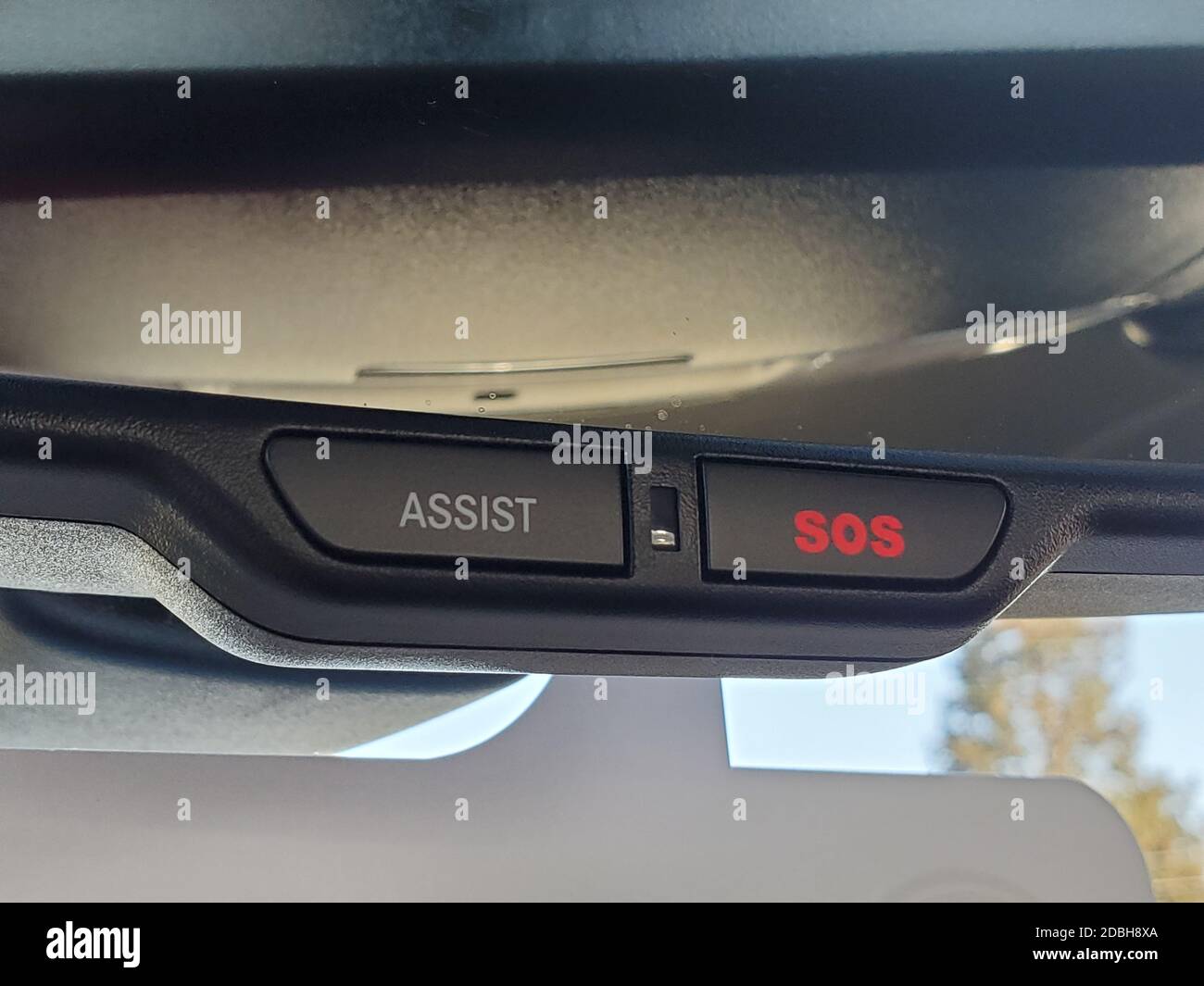 Close-up of the Assist and SOS buttons located above a car rear view mirror in Walnut Creek, California, USA, October 23, 2020. () Stock Photo