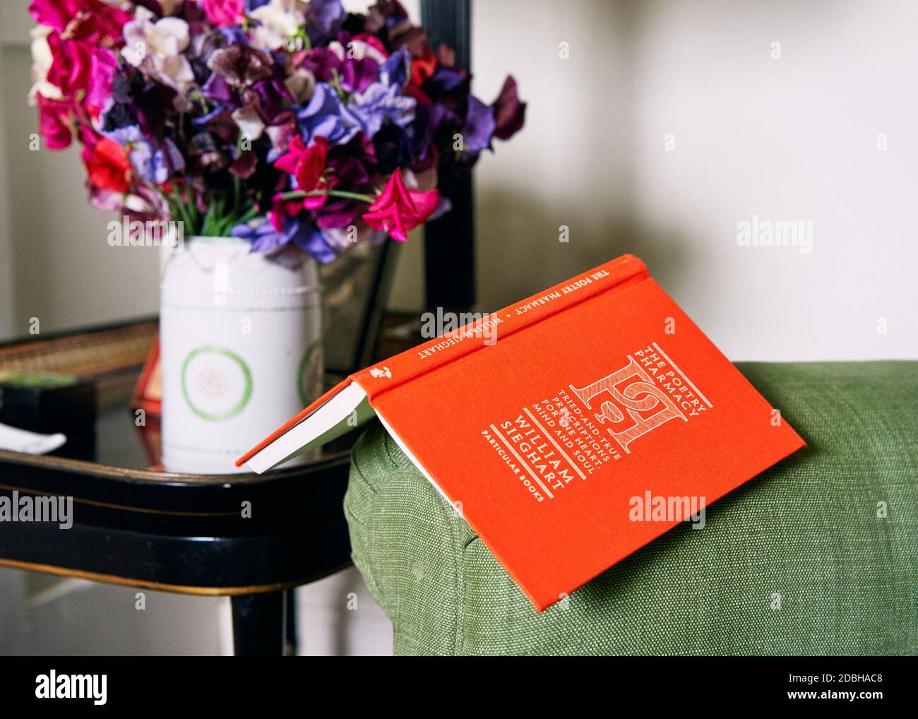The Poetry Pharmacy by William Sieghart in Flora's living room. Stock Photo