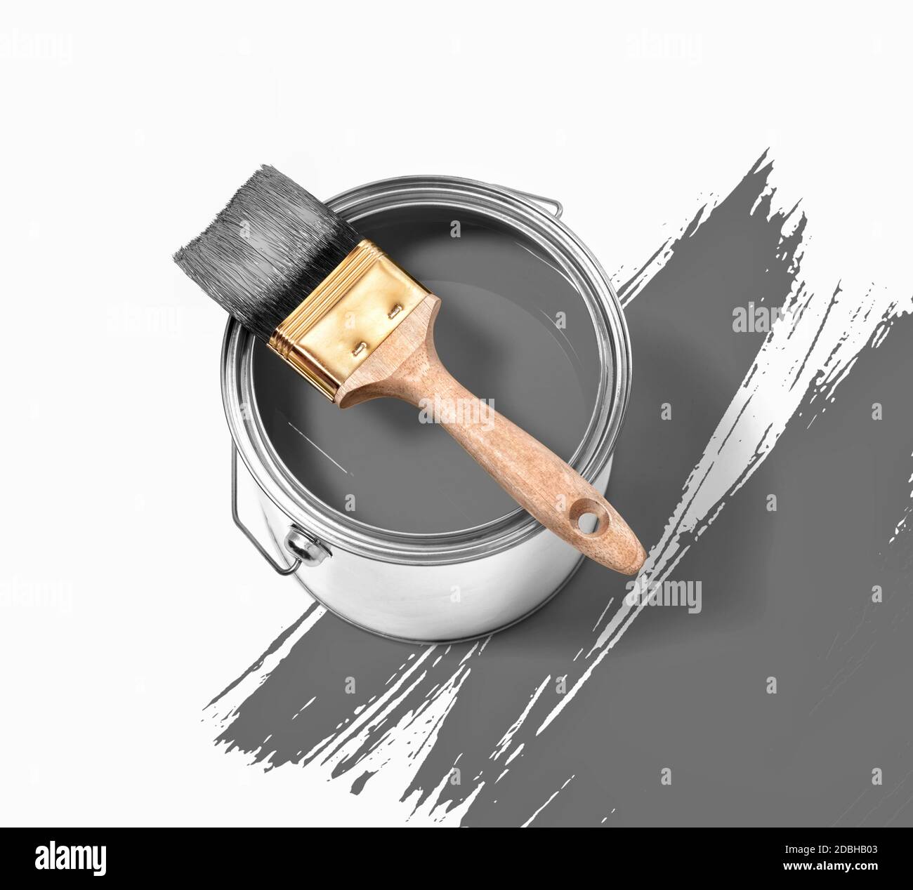 Grey paint tin can with brush on top on a white background with grey