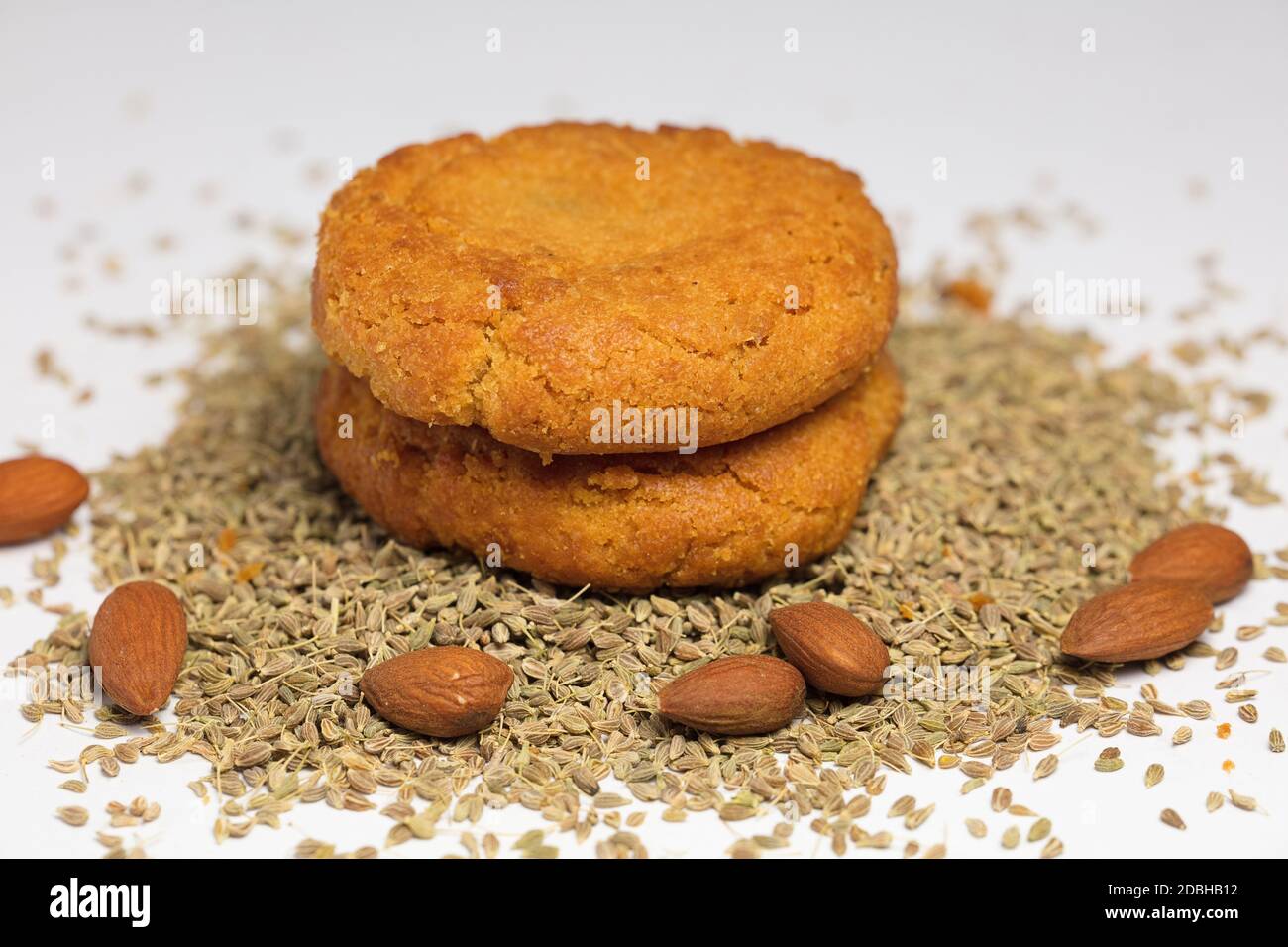 almonds (without shell) and sesame, homemade cookies, white backgrou Stock Photo