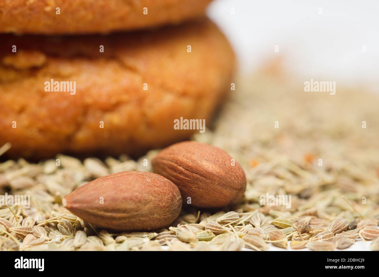 almonds (without shell) and sesame, homemade cookies, white background Stock Photo