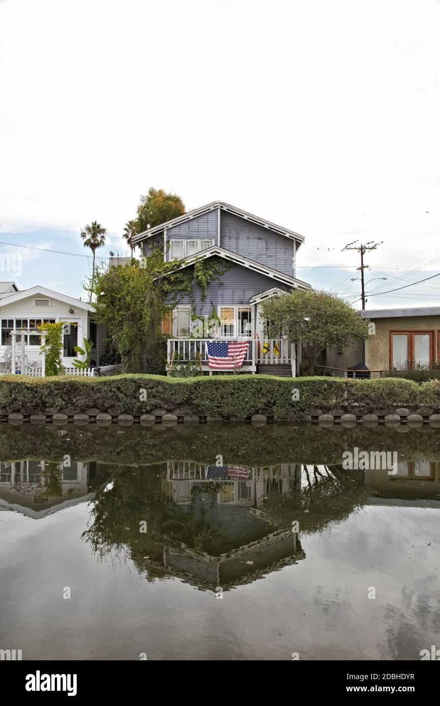 Venice Beach Canals with american flag. Travel landscape Holidays. Santa Monica.jpg Stock Photo