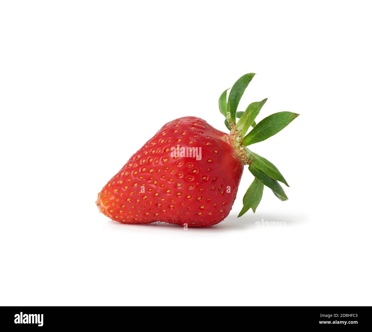 ripe red strawberries with green leaves isolated on a white background ...