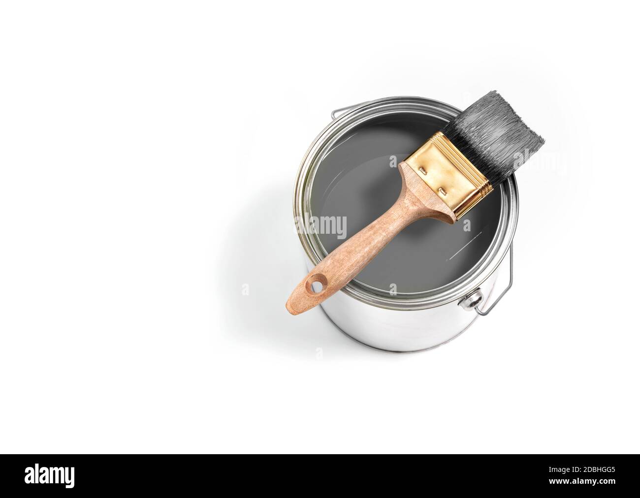 Grey paint tin can with brush on top on a white background with grey