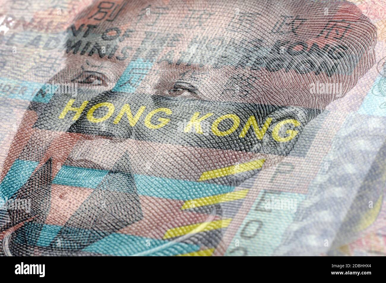 Double exposure on chinese and Hong Kong currency Stock Photo