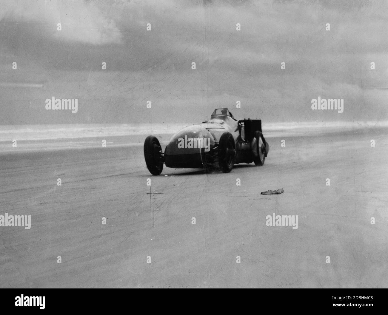 Malcolm Campbell drives his race car Bluebird in Daytona Beach in Florida. Stock Photo