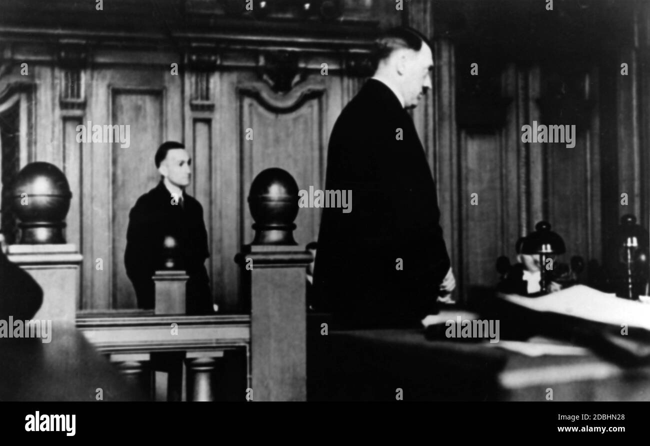 Adolf Hitler testifies at the trial of Hanns Ludin, Hans Friedrich Wendt and Richard Scheringer. The picture shows the later war criminal Hanns Ludin, who was hanged in Czechoslovakia in 1947.  Hitler, supported by his legal counsel Hans Frank, used the publicity of the trial for propaganda purposes and took the so-called oath of legality on September 25, 1930. This oath stated that the NSDAP wanted to achieve power only by legal means. Stock Photo